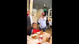 Child uninterested during birthday song at McDonald's, Kota Bandung