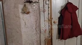 Stove falls through floor in deteriorating house in Khabarovsk, Russia