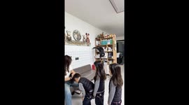 Chinese mom styles triplets' hair in
