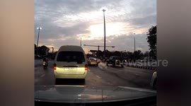 Dashcam captures shocking moment as young student falls from moving school van