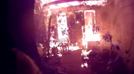 Firefighters save woman, 84, moments before house roof collapses in blaze