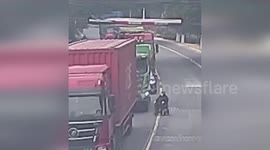 China: Truck Nearly Crushes Wheelchair Man, Rescued by Brave Biker