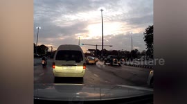 Dashcam captures shocking moment as young student falls from moving school van