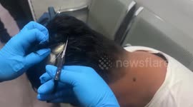Man caught smuggling cocaine in a wig in Cartagena, Colombia
