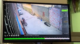 Motorcyclist loses balance and falls into an open drain in Swat, Pakistan