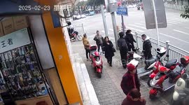 Motorcycle collapses after owner pushes it in Chongqing, China