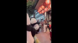 Boy dances with energetic pandas on his family holiday to Bangkok