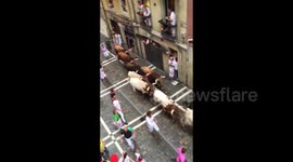 Bulls charge down the streets of Pamplona