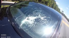 Iron flies out of lorry, smashing a car windscreen