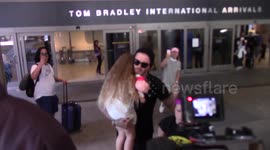 David Beckham arrives at LAX Airport with son Cruz and daughter Harper