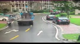 Metal plate flies off truck knocking two people of scooter