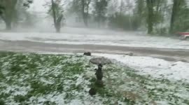 Killdeer ND - Hail piled up street flowing like river