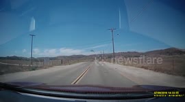 Photographer decides to set up shoot in the middle of a road