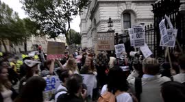 Anti-Tory protesters gather outside Downing Street as Theresa May takes office