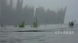 Chinese dam blown up to release floodwater