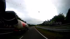 Truck narrowly misses gas tanker in dangerous overtaking manoeuvre