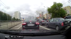 Pedestrian hit by scooter after trying to cross a risky road