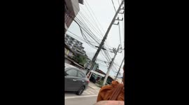 Tourists give Buddhist monks a lift home in Thailand