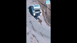 Man Fixes Pothole In Road