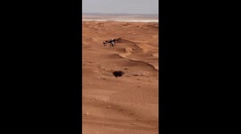Drones help battle desertification in N China