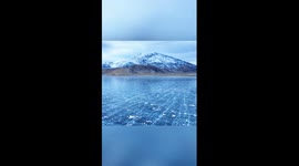A glimpse of fractured ice patterns on lake in NW China