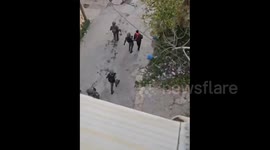 Israeli soldiers detain a Palestinian youth in the town of Beita, south of Nablus