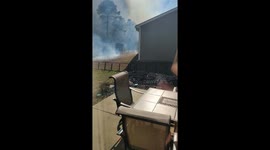 As we are packing to leave to escape the forest fire in Myrtle Beach SC the neighbors yard caught on fire