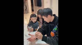 Joy of magic: Father treats son to an enchanting trick in their home