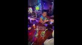 Thai boy selling roses insists boyfriend give one to his girlfriend