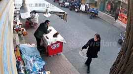 Puppy nearly hit by motorcycle in Henan, China