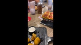 Man accidentally spills entire cheese container on pizza in Puerto Cortés, Honduras
