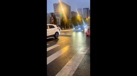Chinese man cosplayed a wizard and rode electric scooter with a traffic cone on his head
