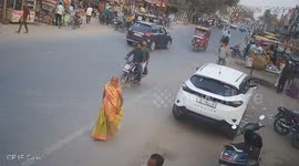 A car hit the bike riders sending them flying into the Air. Thankfully, both survived