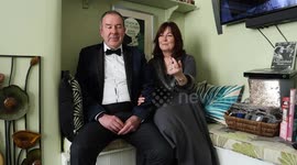 Couple dress-up for 'Movie Night' watching 1000 classics for 20 years