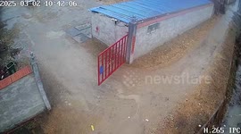 Storm tears roof from outhouse building in China