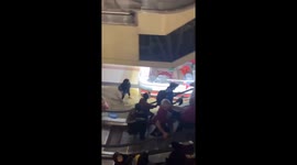 Floods surge into shopping mall amid heavy rain in Indonesia