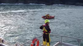 RNLI rescues stricken fishing boat crew clinging to rocks in Padstow