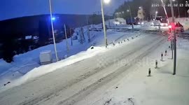 Train almost hits bus after foolish driver heads onto tracks as barrier comes down