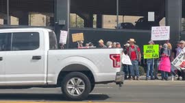 Thousands gather and protest against Elon musk outside of Space X Facility.