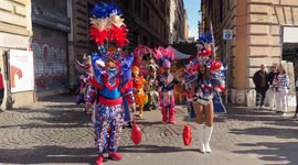 People from the Dominican Republic in traditional dress during the procession to celebrate independence from the Government of Haiti and celebrate Carnival in Rome.