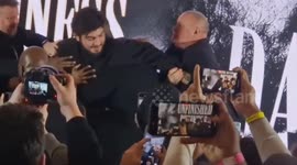 KSI slaps Dillon Danis with a pancake at pre-fight presser in London