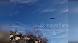 Italy: Firefighter Plane Leads Charge Against Raging Forest Blaze