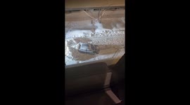 Car Gets Special Ride From Snow Remover