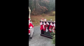 Dad Embarasses Daughters in Santa Costume