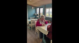 Mini train delivers birthday breakfast to elderly couple in Newenden, England, UK