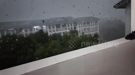 Wind blows leaves and curtains in Jiangmen, China