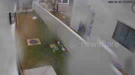 Howling storm tears glass doors and windows from building in Thailand