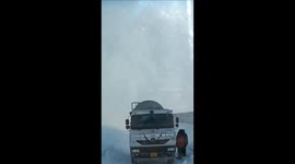 Motorist films as avalanche crashes down mountain and swallows vehicles below