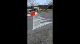 Satisfying footage shows road markings being spray painted
