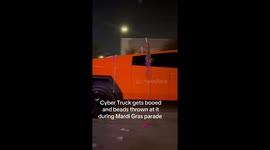 Cybertruck booed and pelted during Mardi Gras chaos